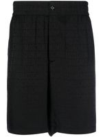 Moschino short à motif monogrammé - Noir