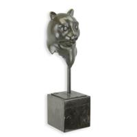 A BRONZE SCULPTURE OF A CATS HEAD