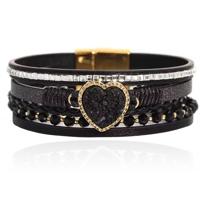 Deja Armband goudkleurig met hartvormige natuursteen in zwart