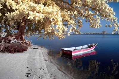 Glasschilderij boot op meer