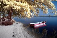 Glasschilderij boot op meer