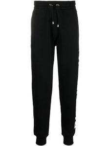 Balmain pantalon de jogging UEZ Vert en coton - Noir