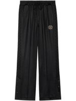 Gucci pantalon de jogging à logo GG entrelacé - Noir