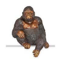 A BRONZE SCULPTURE OF A SITTING GORILLA A BRONZE SCULPTURE OF A SITTING GORILLA