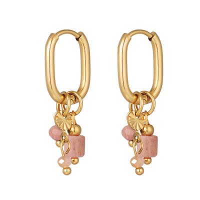 Gouden oorbellen met roze kralen