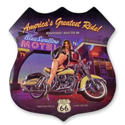 AN EMBOSSED TIN PLATE "AMERICA'S GREATEST RIDE!"