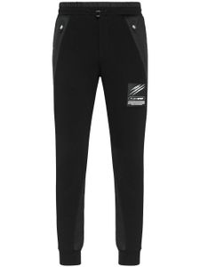 Plein Sport pantalon de jogging en coton mélangé à patch logo - Noir