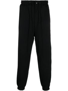 Junya Watanabe MAN pantalon de jogging à lien de resserrage - Noir