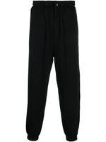 Junya Watanabe MAN pantalon de jogging à lien de resserrage - Noir