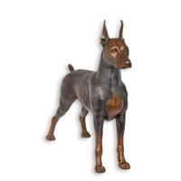 A BRONZE SCULPTURE OF A DOBERMAN