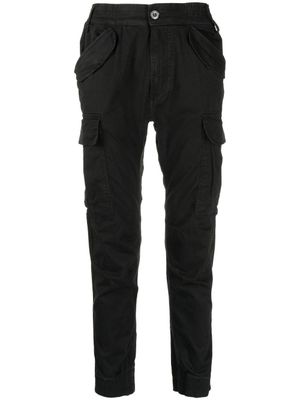 Alpha Industries pantalon à poche devant à rabat - Noir