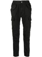 Alpha Industries pantalon à poche devant à rabat - Noir