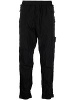 Stone Island pantalon de jogging à motif Compass - Noir