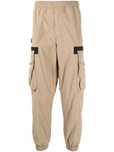 AAPE BY *A BATHING APE® pantalon fuselé à taille élastiquée - Marron