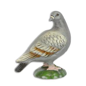 A CAST IRON SCULPTURE OF A PIGEON