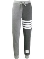 Thom Browne pantalon de jogging à 4 bandes signature - Gris