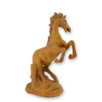 A RUSTY CAST IRON FIGURINE OF A STAGGERING HORSE