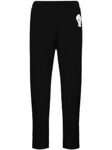 Alexander McQueen pantalon de jogging à tête de mort brodée - Noir