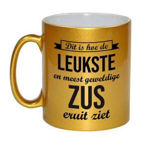 Leukste en meest geweldige zus cadeau mok / beker goudglanzend 330 ml - feest mokken