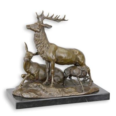 A BRONZE GROUP OF A DEER FAMILY