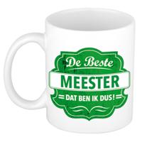 Bellatio Decorations De beste meester koffiemok - cadeau beker - wit - groen embleem - 300 ml