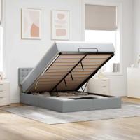 Ottoman bed met matras en LED's 140x200cm stof lichtgrijs