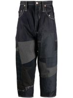 Junya Watanabe MAN pantalon à design patchwork - Bleu