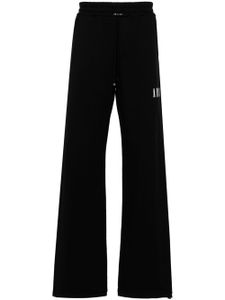 AMIRI pantalon de jogging Core à logo imprimé - Noir