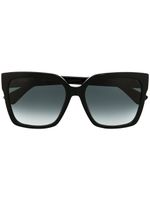 Moschino Eyewear lunettes de soleil à détail de clous - Noir