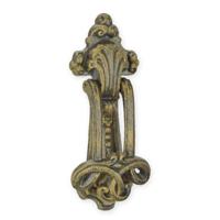 A CAST IRON ORNAMENTAL DOOR KNOCKER