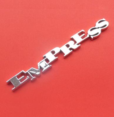 Rock-Ola Empress afdekkap embleem