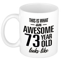 Awesome 73 year cadeau mok / verjaardag beker 300 ml   -