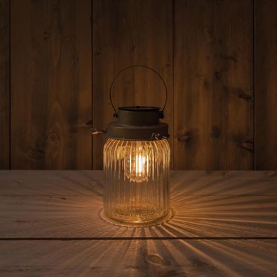 Transparante solar lantaarn van gestreept glas met hengsel 18 cm Transparante solar lantaarn van gestreept glas met hengsel 18 cm