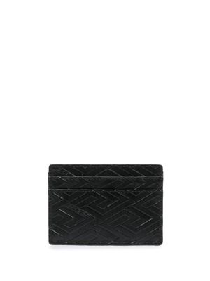 Versace porte-cartes en cuir à motif monogrammé embossé - Noir