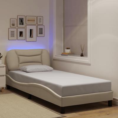 Bedframe met LED-verlichting stof crèmekleurig 80x200 cm