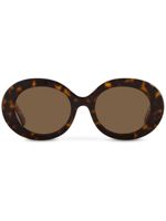 Dolce & Gabbana Eyewear lunettes de soleil rondes à effet écailles de tortue - Marron