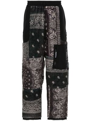 Neighborhood pantalon de jogging à imprimé bandana - Noir