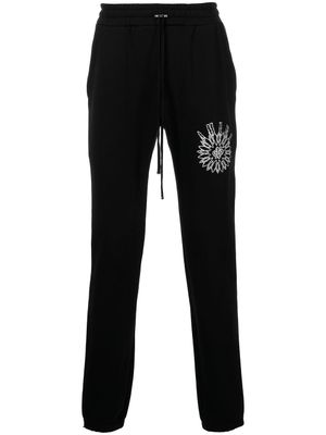 AMIRI pantalon de jogging slim à logo imprimé - Noir