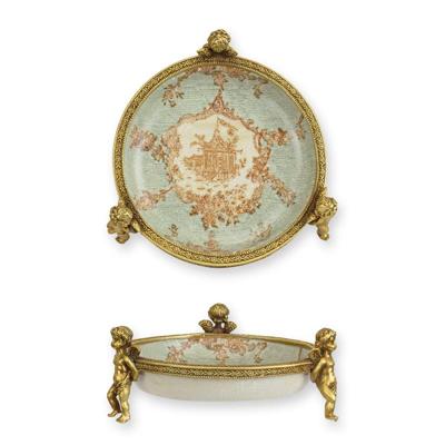 A BRASS MOUNTED PORCELAIN DISH