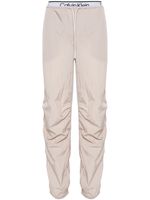 Calvin Klein pantalon de jogging à logo en jacquard - Tons neutres