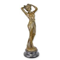 A BRONZE SCULPTURE OF A WOMAN PLAYING WITH HER HAIR