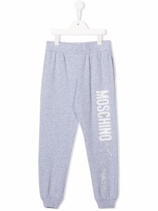 Moschino Kids pantalon de jogging à logo strassé - Gris