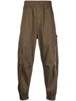 Stone Island Shadow Project pantalon à patch Compass - Vert Stone Island Shadow Project pantalon à patch Compass - Vert