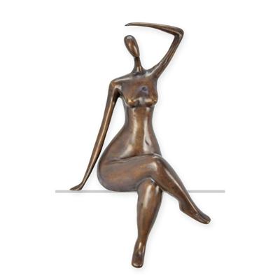 A BRONZE SCULPTURE OF A SITTING FAT ASS WOMAN