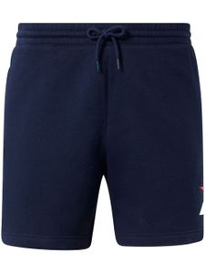 Reebok short de sport à logo imprimé - Bleu