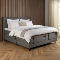 Elektrisch Verstelbare 2-Persoons Elektrische Boxspring Lizz - Grijs 180x200 Cm - Pocketvering - Inclusief Topper - Dekbed-Discounter.nl Elektrisch Verstelbare 2-Persoons Elektrische Boxspring Lizz - Grijs 180x200 Cm - Pocketvering - Inclusief Topper - Dekbed-Discounter.nl