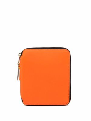 Comme Des Garçons Wallet portefeuille zippé en cuir - Orange