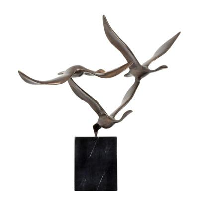 A BRONZE SCULPTURE OF TREE FLYING GEESE