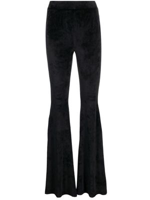 GCDS pantalon en velours à coupe évasée - Noir