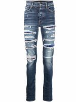 AMIRI jean slim à effet usé - Bleu